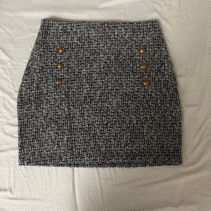 Tweed skirt with button detail